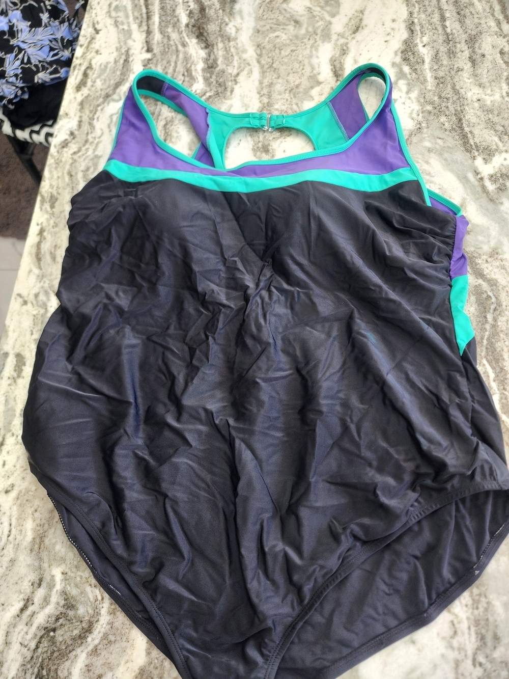 Black One-Piece Swimsuit with Teal and Purple Accents